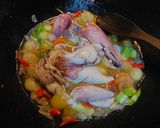 Foto langkah ke 8 dari resep Cumi Isi Tahu Kuah Asam.