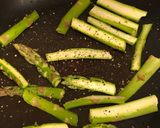 A picture of step 3 of Jamon iberico, asparagus, pear and goats cheese salad.
