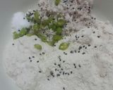 A picture of step 1 of Til narkol postor bora (Sesame coconut and poppy seed fritters).