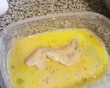 A picture of step 3 of Parmesan and Panko Baked Chicken Tenders.