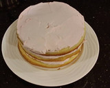 A picture of step 28 of Lemon Layer Cake with Blackberrie Cream Filling and a Lemon Cream Frosting.