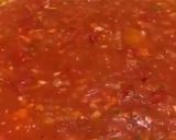 A picture of step 2 of Fregola sarda with prawns, squid, scallops, blue eye cod and light tomato sauce.