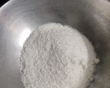 A picture of step 1 of Coconut ladoo.