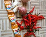 Foto langkah ke 3 dari resep Pare tumis pindang terasi.