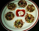 A picture of step 7 of Bread Chicken pizza Muffins😋😍.
