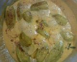 A picture of step 8 of Dudh potol (pointed gourd in milky gravy).