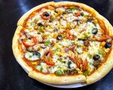 A picture of step 6 of Veg Pizza.