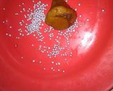 A picture of step 6 of Biscuits modak with tutifruti filling.
