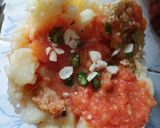 A picture of step 5 of Littichokha with baigan chutney and fried chilli onions.