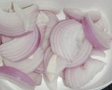 A picture of step 1 of Masala onion.