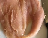 A picture of step 3 of Rolled smashed chicken with ham and cheese.