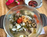 Hình bước làm 8 của món Canh Chua Đầu Cá Hú Nấu Lá Giang