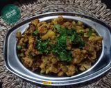 A picture of step 11 of Aloo Gobhi Matar Curry.