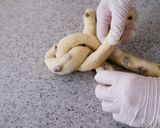 A picture of step 11 of Soft Chewy Braided Raisin Bread.