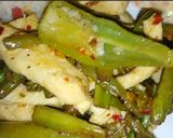 A picture of step 6 of French beans chicken and veg fried rice.