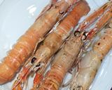 Foto del paso 2 de la receta: Arroz con manitas de conejo, cigalas, sepia y langostinos
