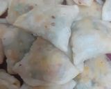 A picture of step 7 of The 3 C ' s Cocktail Samosas.