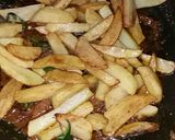 A picture of step 4 of Spicy fried potato sabzi.