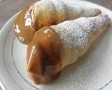 Foto del paso 8 de la receta: Cañoncitos de hojaldre con relleno de dulce de leche