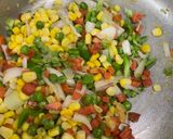 A picture of step 4 of Egg & Vegetable Fried Rice.