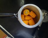 A picture of step 2 of Masala corn cob.