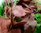 A picture of step 1 of Red Amaranth (Leaf/ Saag) with Rice.