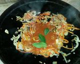 Foto del paso 4 de la receta: Sandwiches de chorizo de cerdo a la pomarola. "al disco de arado"