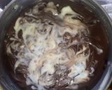 A picture of step 5 of No bake Chocolate biscuit cake.