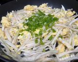A picture of step 9 of Stir-Fried Eggs with Water Bamboo.