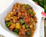 A picture of step 3 of Stir fried potatoes with veggies and gizzard.