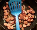 A picture of step 3 of Blessing’s Fried sauté egg & sausages and plantain.