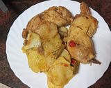 Foto del paso 6 de la receta Muslitos de pollo sobre cama de papas y verduras al horno
