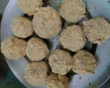 A picture of step 9 of Stuffed cheesy mushroom balls.
