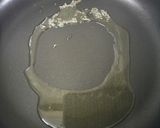 A picture of step 2 of Seyal paav (bread in onion tomato gravy).