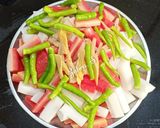 A picture of step 1 of Instant carrot,raddish and green chilli pickle.
