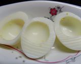 Foto del paso 3 de la receta: Huevos en canoa y huevos rellenos