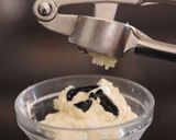 A picture of step 1 of Creamy black rice with squid and olive oil recipe.