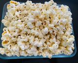 A picture of step 3 of Low-Calorie Microwave Popcorn.