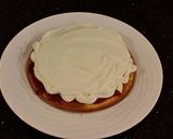 A picture of step 16 of Vanilla Lemon Raspberry Layer Cake with Whipped Cream Buttercream Frosting.
