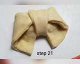 A picture of step 22 of Bow tie buns.