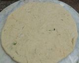 A picture of step 4 of Muli de parathe with batter and dahi.