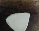 A picture of step 7 of Badam puri.