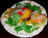 A picture of step 13 of Mike's Smoked Fajita Wraps.