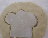 A picture of step 7 of Carrot cookpad logo cake.