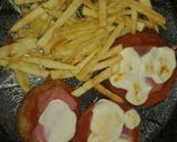 Foto del paso 5 de la receta: Milanesa de zapallo a la napolitana con papas fritas