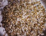 A picture of step 1 of Split Green Moong Dal Khichdi.