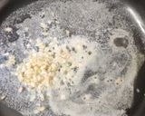 A picture of step 4 of Broccoli pasta in white garlic sauce.