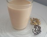 A picture of step 2 of Red Tea with Milk, Cloves, and Cardamom.