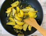 A picture of step 5 of Umami Taste Potatoes with Shiitake Powder and Lots of Cilantro.