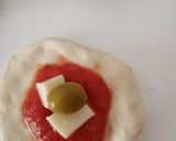 A picture of step 8 of Pizza bombs.